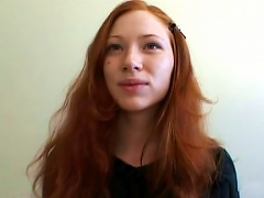 Slim Redhead Babe Millena Demonstrates Her Puss