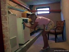 Pierced Blonde Gives A Nice Hand Job In The Basement