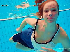 Skinny Russian Bint Dives Into The Pool Completely Naked
